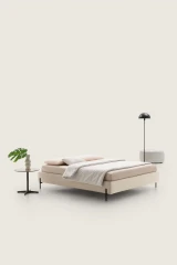 Sommier — Minimalist space-saving bed with no headboard or footboard.