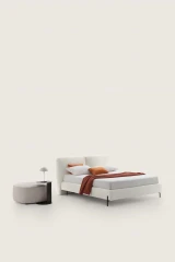 Duo — Bed with an upholstered headboard equipped with an adjustable mechanism.