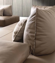 Bacio Light — Space-saving modular sofa with a compact design and movable backrests – also available in leather.