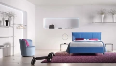Plumeria — Space-saving bed with a vertically stitched padded headboard.
