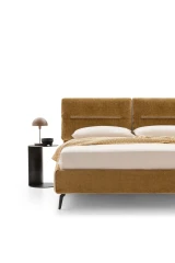 Academy — Comfortable bed with soft cushions integrated into the headboard