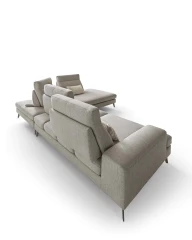 Emmet — Sofa with sliding backrests.