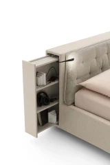 Donovan — Upholstered bed with a headboard equipped with a bookshelf and retractable LED lights.