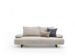 Fanny — Modular sofa with organic shapes, sliding backrests, and adjustable armrests