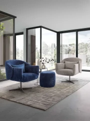 Wrap — Futuristic armchair available with a fixed or swivel base, featuring sleek and modern lines.
