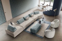 Houston light — Space-saving low modular sofa with light quilting on the seat and backrests.