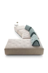 Houston light — Space-saving low modular sofa with light quilting on the seat and backrests.