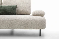 Fanny — Modular sofa with organic shapes, sliding backrests, and adjustable armrests