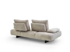 Fanny — Modular sofa with organic shapes, sliding backrests, and adjustable armrests