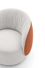Moby — Rounded one-piece frame armchair with a quilted backrest and optional fixed or swivel base.