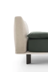 Fenice — Bed with a headboard made of soft upholstered cushions.
