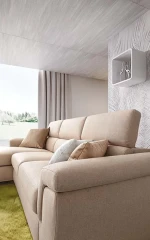 Pieris — Classic sofa with storage mechanisms, adjustable headrests, and extendable footrest.