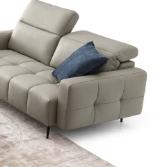 Gillan — Modular sofa with a rounded design, adjustable headrests, and a chaise lounge.