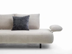 Fanny — Modular sofa with organic shapes, sliding backrests, and adjustable armrests