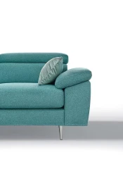 Greta — Modern, minimal sofa with extendable footrest and adjustable headrests.