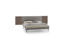Wall — Contract bed with a simple, smooth padded headboard and side shelves.