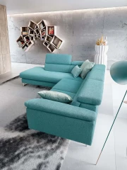 Greta — Modern, minimal sofa with extendable footrest and adjustable headrests.