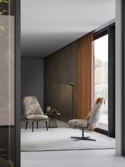 Lord — Minimalist armchair with a fixed or swivel base, round seat and high backrest.