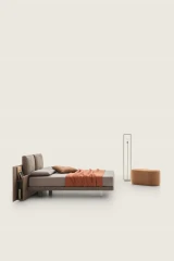 Opera — Bookcase bed with headboard featuring large cushions.