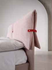 Primrose — Space-saving bed with a headboard featuring large padded cushions secured with buckles.