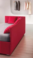 Solanum — Single corner daybed with a wave-shaped backrest.