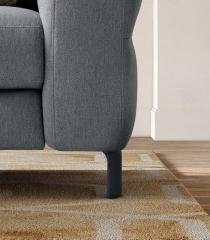Egon — Recliner sofa with adjustable headrests, and vertically stitched backrest.
