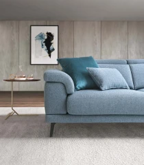 Norton — Modern sofa with extendable seats, adjustable headrests, and decorative borders.