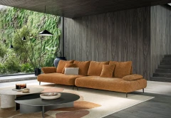 Fanny — Modular sofa with organic shapes, sliding backrests, and adjustable armrests