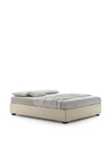 Sommier — Minimalist space-saving bed with no headboard or footboard.