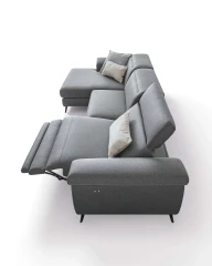 Zeno — Modern recliner sofa with adjustable headrests in a curved, enveloping design.