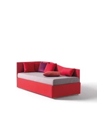 Solanum — Single corner daybed with a wave-shaped backrest.