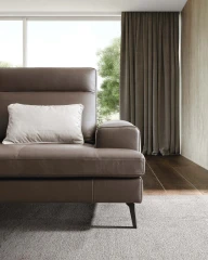 Emmet — Sofa with sliding backrests.