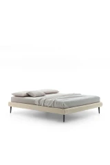 Sommier — Minimalist space-saving bed with no headboard or footboard.