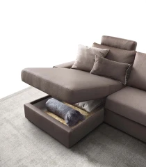 Icaro — Classic sofa with decorative borders and storage mechanism.