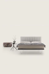 Celine — Space-saving design bed with a vertically padded headboard.