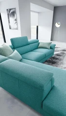 Greta — Modern, minimal sofa with extendable footrest and adjustable headrests.