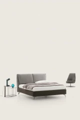 Fold — Bed with a headboard made of large adjustable cushions.