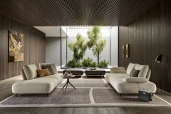 Fanny — Modular sofa with organic shapes, sliding backrests, and adjustable armrests