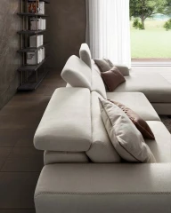 Graffiti — Elegant sofa with extendable seats, adjustable headrests, and visible stitching.