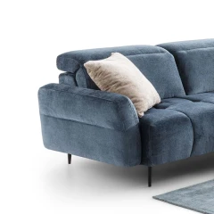 Gillan — Modular sofa with a rounded design, adjustable headrests, and a chaise lounge.