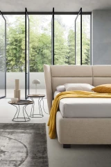 Pasodoble — Elegant wingback bed with wide padded headboard.
