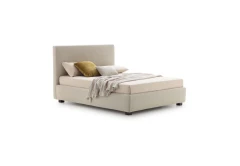 Illy — Modern minimalist bed with a wide, linear headboard.