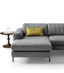 Egon — Recliner sofa with adjustable headrests, and vertically stitched backrest.