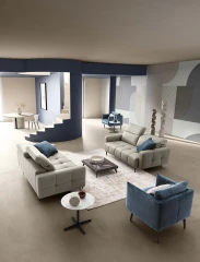Gillan — Modular sofa with a rounded design, adjustable headrests, and a chaise lounge.