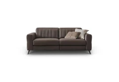 Egon — Recliner sofa with adjustable headrests, and vertically stitched backrest.