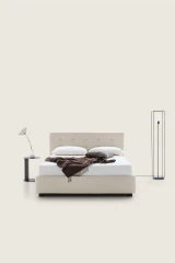 Tender — Modern squared bed with light tufting on the headboard.