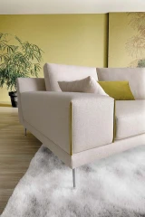 Pontia — Modern sofa with squared armrests, varying backrest heights, and customizable borders.