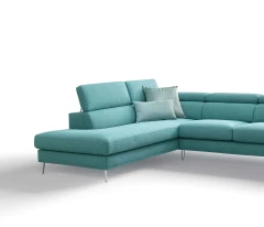 Greta — Modern, minimal sofa with extendable footrest and adjustable headrests.