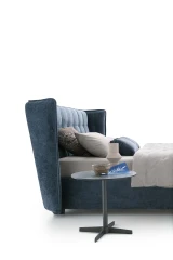 Aspen — Wingback bed with a quilted headboard.