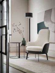 Queen — Fixed or swivel armchair with a high, comfortable backrest. Option for bicolor upholstery and customizable legs.